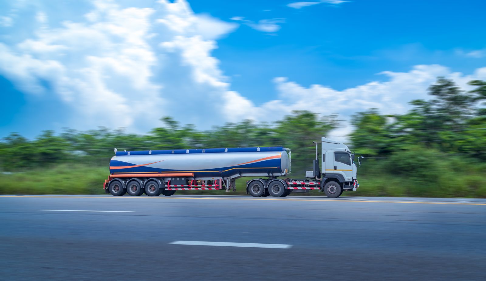 Tanker truck travelling on a dual-carriageway highway